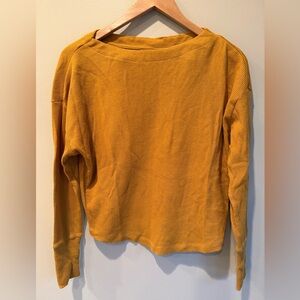 ANTHRO AKEMI + KIN XS cropped long sleeve mustard colored thermal with boat neck